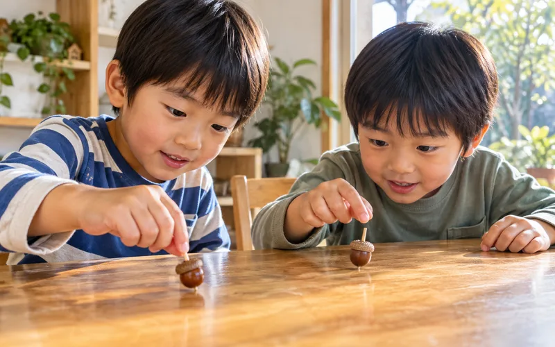 どんぐりごま対決で遊ぶ子ども