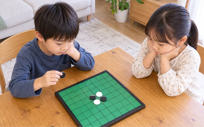 家族でボードゲーム入門で遊ぶ子ども