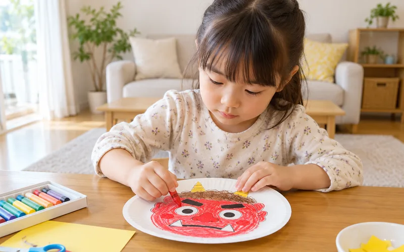 紙皿の鬼のお面づくりで遊ぶ子ども
